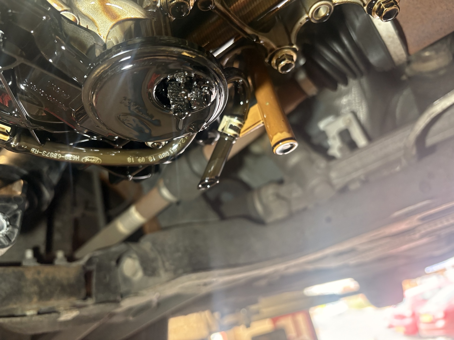 Oil strainer contaminated with belt debris